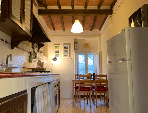 The kitchen comes with all mod cons and sits four.